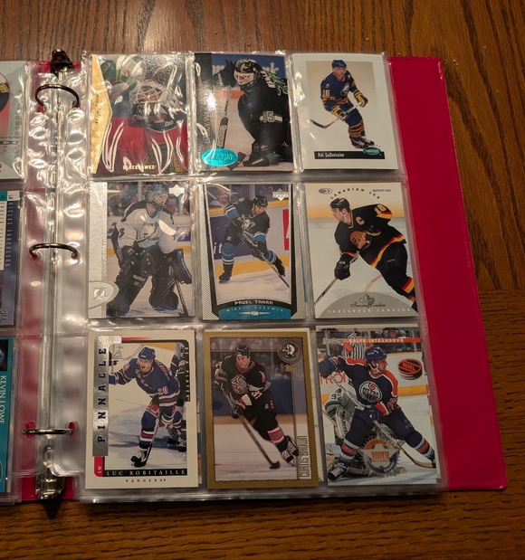 binder for hockey cards Card 900 Pockets, Trading Card Binder Holder with 50 Removable Sleeves Fits 900 Sport Cards, Hockey Card Gifts Collector Album with Zipper Storage Display Case : Toys & Games This smaller size is portable and stacks neatly PU Leather Card Binder Hockey